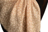 Small White Flowers On Textured Beige Scarf