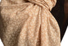 Small White Flowers On Textured Beige Scarf